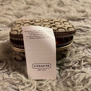 Coach brown pill box